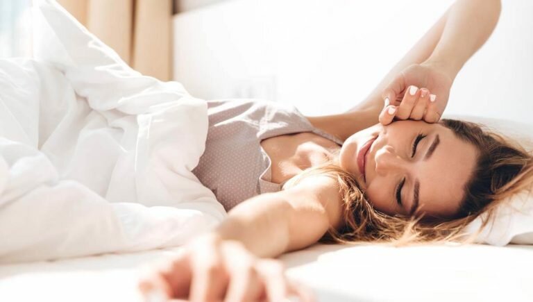 woman sleep with sunscreen on the face